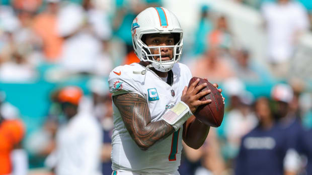 Miami Dolphins quarterback Tua Tagovailoa (1) drops back to pass against the Denver Broncos in the third quarter at Hard Rock Stadium.